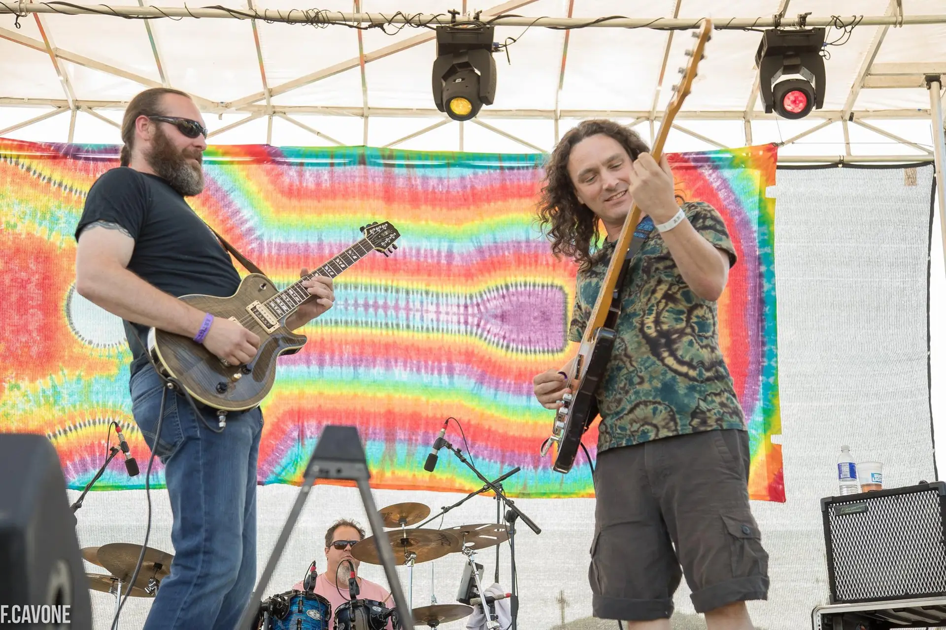 Musicians jamming on stage at the Adirondack Independence Music Festival in Lake George NY