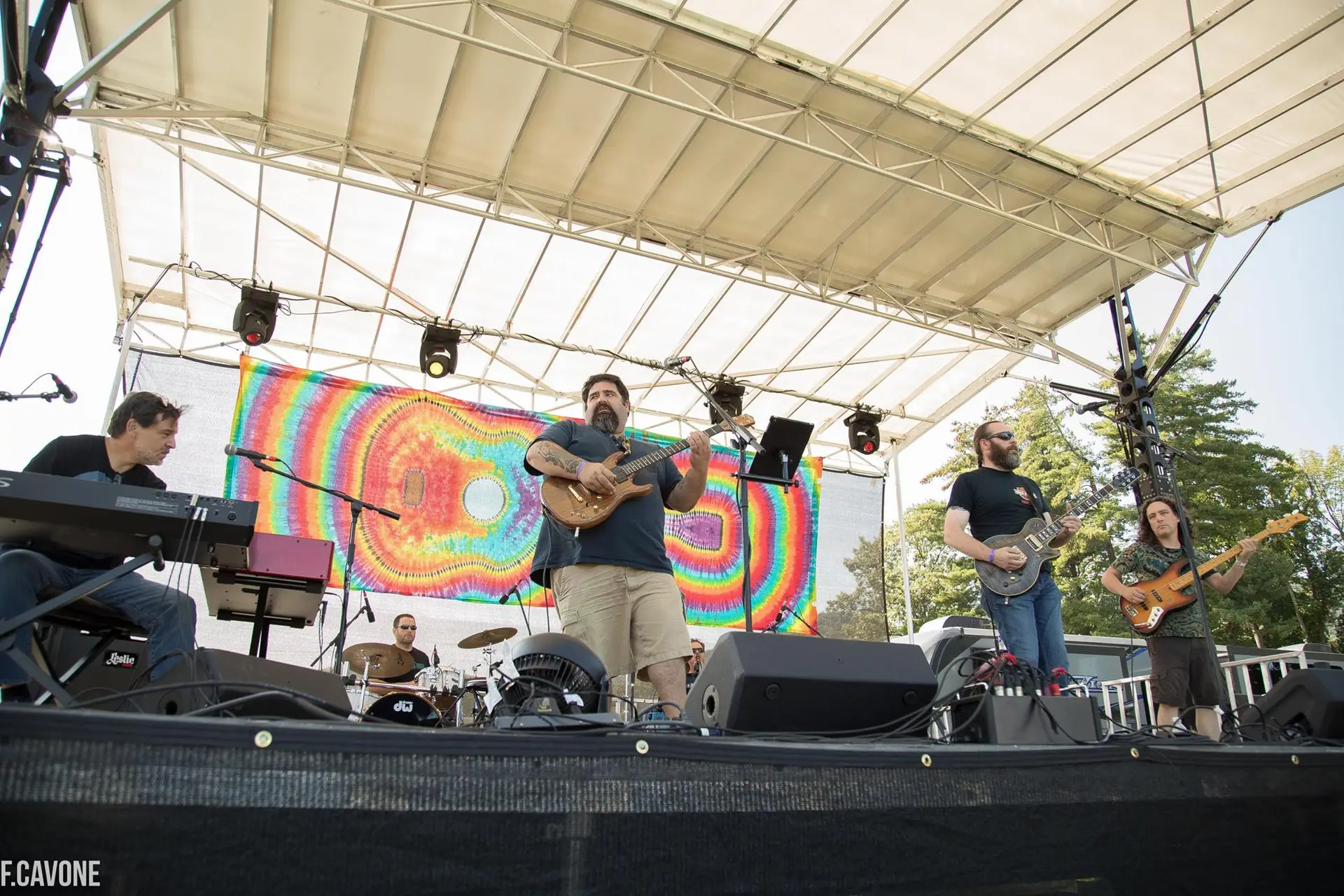 Band performing on stage at the Adirondack Independence Music Festival in Lake George NY