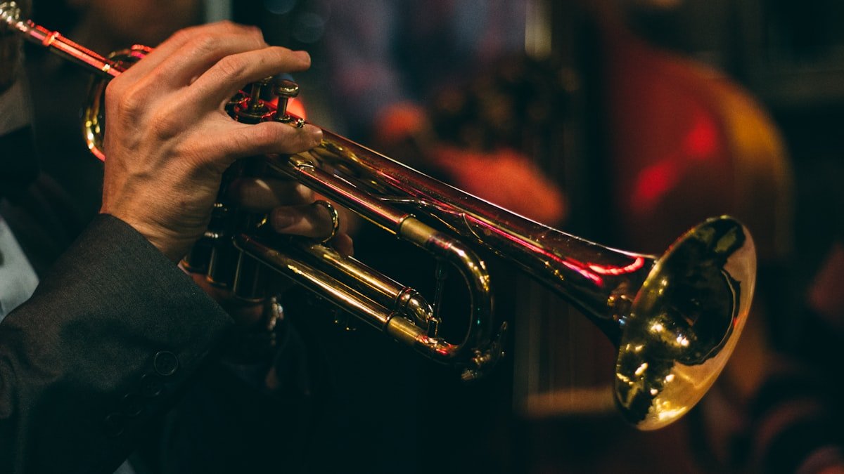Jazz trumpet player with upright bass in intimate venue