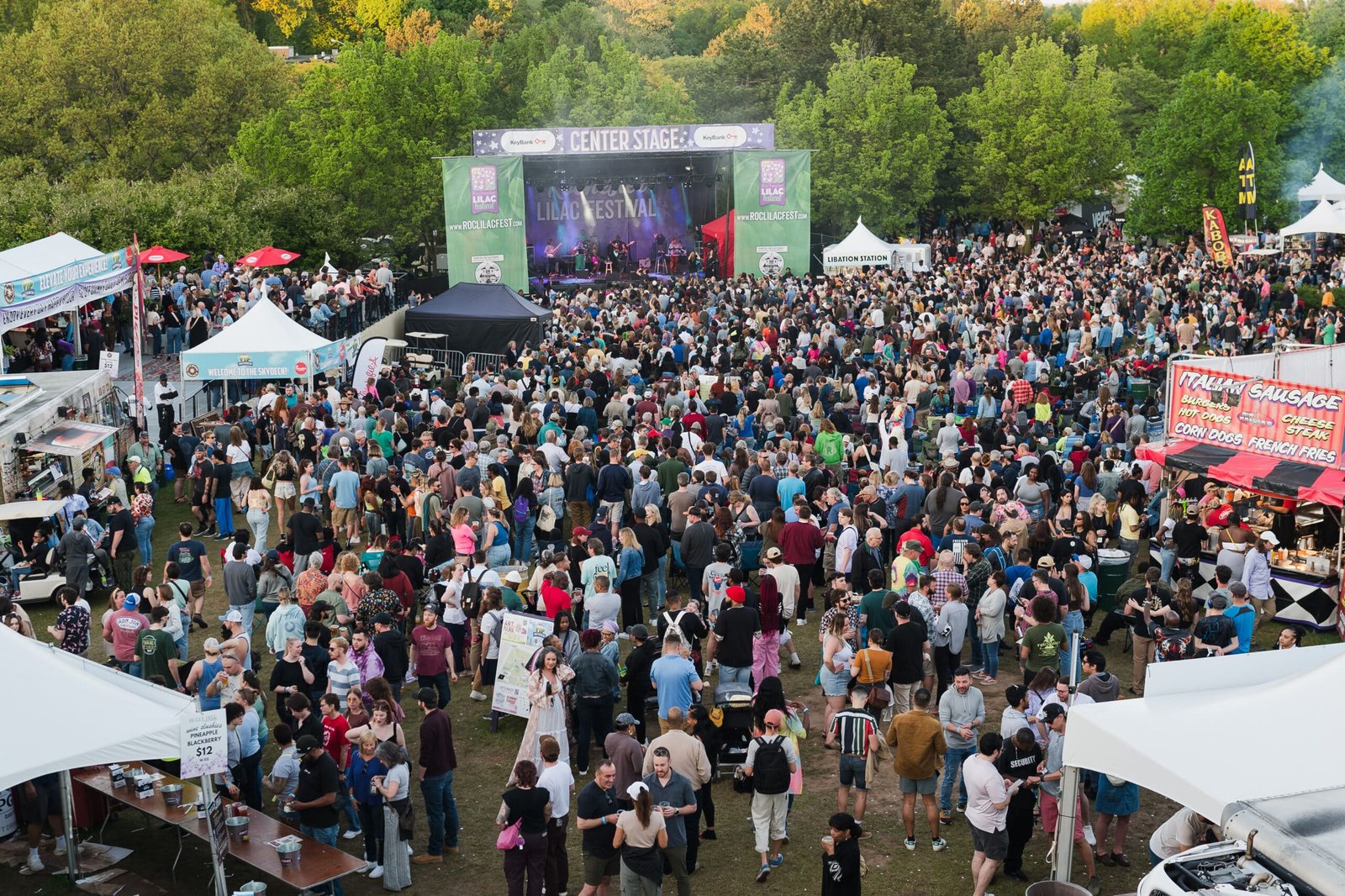 Thousands of festivalgoers pack the grounds at the KeyBank Center Stage during the Rochester Lilac Festival in Highland Park