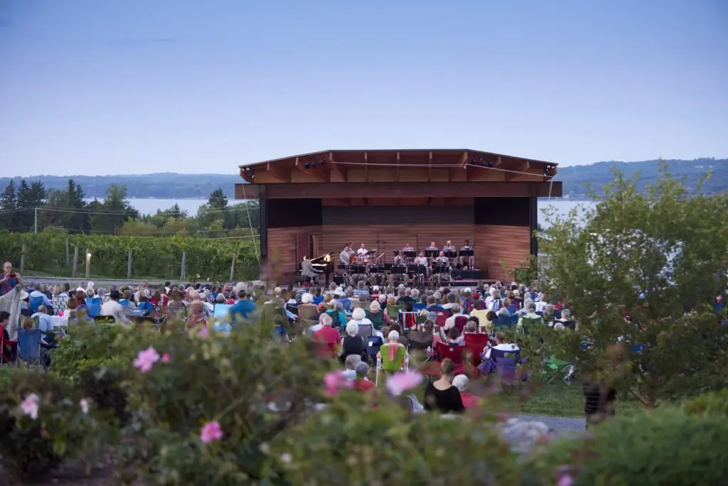 Outdoor concert at the Skaneateles Festival with Skaneateles Lake in the background