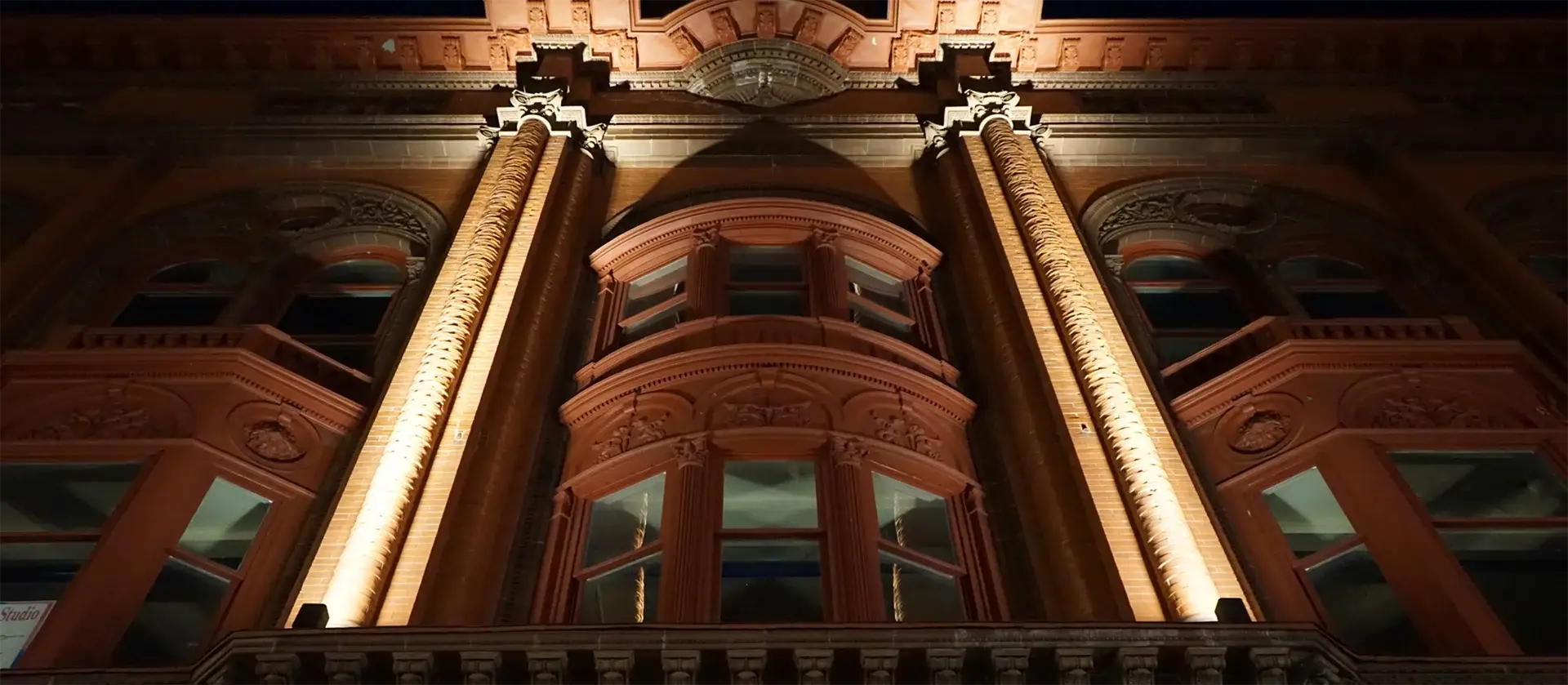 Smith Center for the Arts exterior historic opera house facade illuminated at night on Seneca Street in Geneva New York