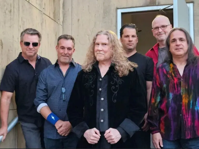 Bowie Station, the six-piece Long Island David Bowie tribute band, poses for a group photo