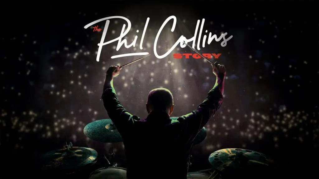 The Phil Collins Story performs live — drummer raises drumsticks on a dramatic lit stage