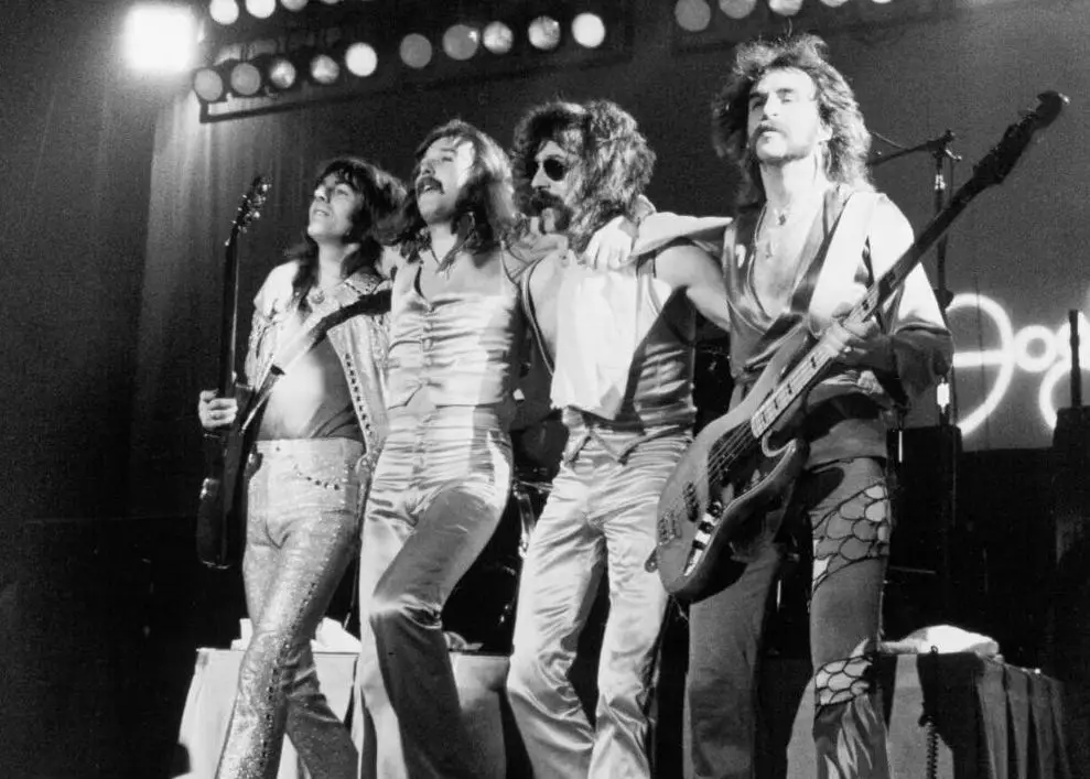 Foghat performing live, circa late 1970s — Foghat logo visible on stage backdrop