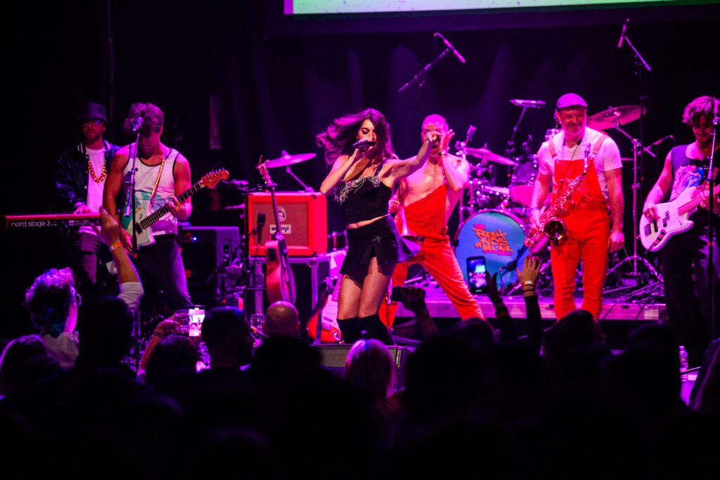 The Fresh Kids of Bel-Air perform live on stage with full band