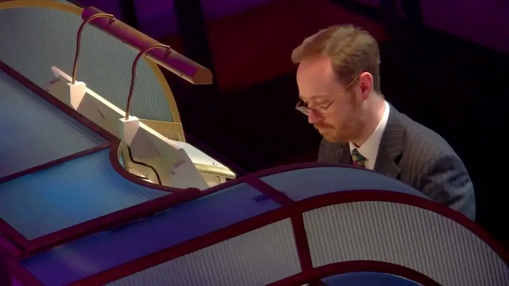 Richard Hills FRCO performs at Wurlitzer organ console during Musical Museum Live concert
