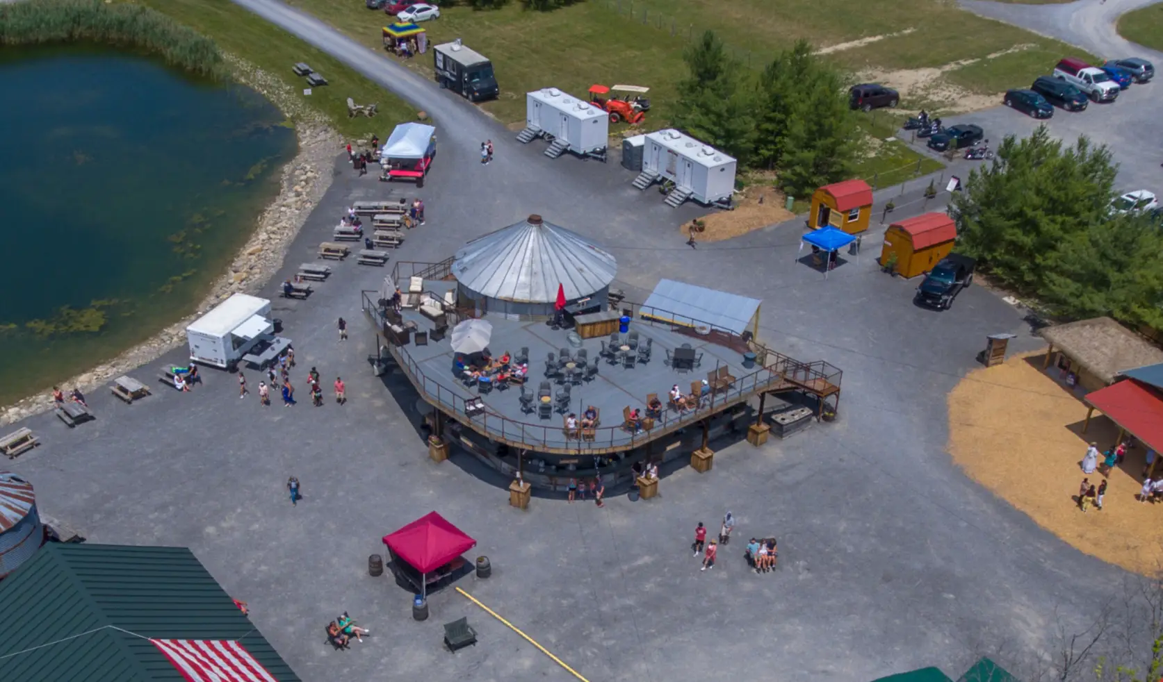 Aerial view of Lincoln Hill Farms showing the elevated VIP deck, silo and rolling Finger Lakes farmland