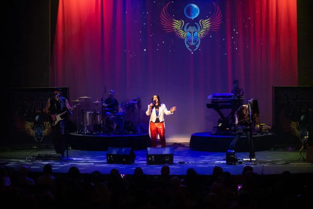 Separate Ways The Band performs live on stage, lead vocalist Danny Gagliano center with full band