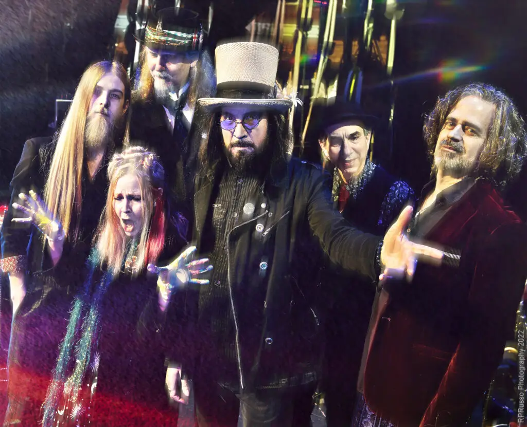 The Slambovian Circus of Dreams band promo photo — six members in theatrical costumes