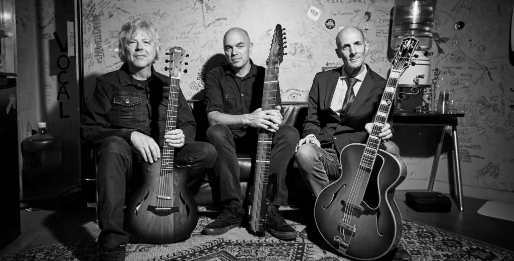 California Guitar Trio backstage with their guitars ahead of a live performance