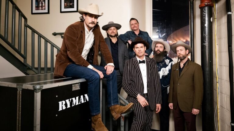 Old Crow Medicine Show pose backstage at the Ryman Auditorium in Nashville