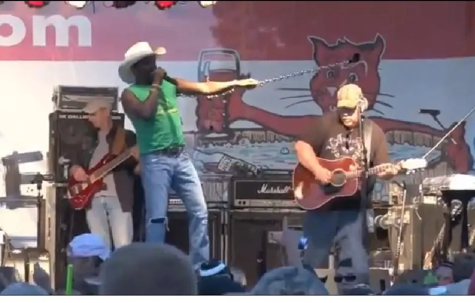 Chris Taylor and the Custom Taylor Band performing live on stage at FrogFest