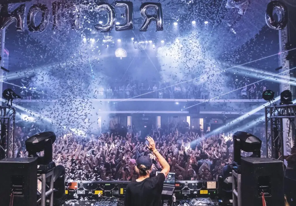 Club 90s DJ performing to a packed crowd with confetti at Town Ballroom Buffalo