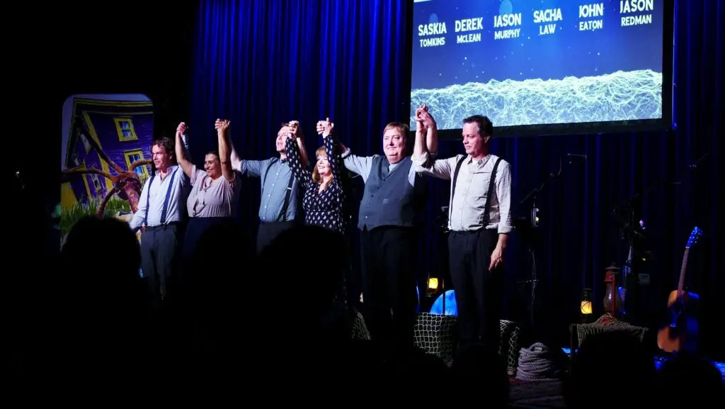 Shipyard Kitchen Party ensemble taking a curtain call during the Newfoundland Songbook tour