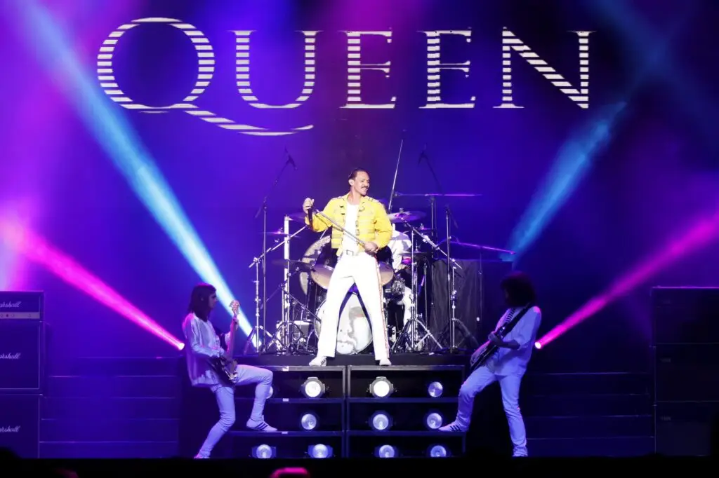 Warren Vernon-Driscoll performs as Freddie Mercury in Queen: It's a Kinda Magic, live on stage with full band
