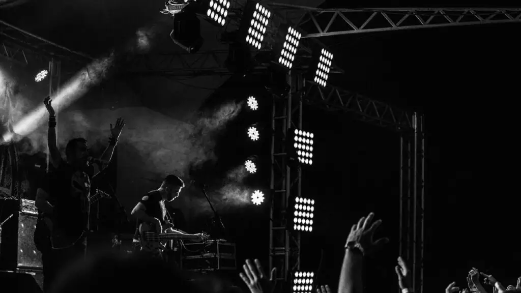 A Farewell 2 Kings Rush tribute band performing live on stage with dramatic lighting