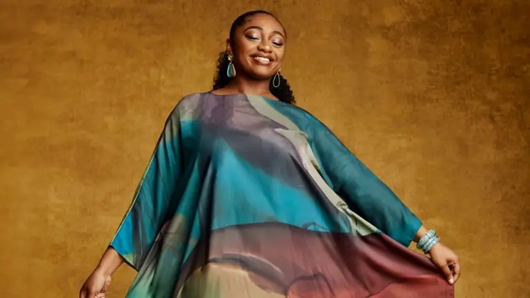 Samara Joy in a flowing colorful kaftan, official promotional photo for her Portrait tour