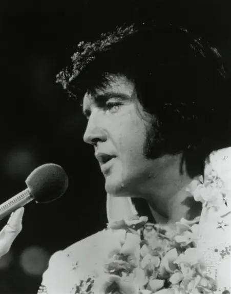 Elvis Presley in a white jumpsuit, 1973