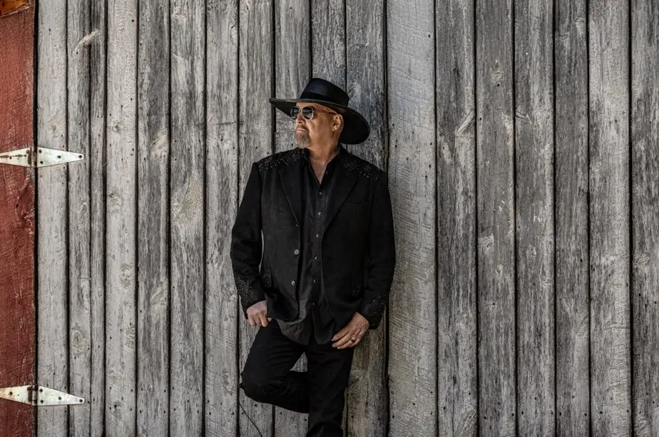Eddie Montgomery of Montgomery Gentry performs live, wearing his signature black cowboy hat