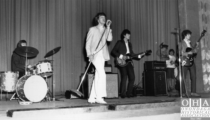 The Rolling Stones performing on stage at the Onondaga County War Memorial in Syracuse in 1966.