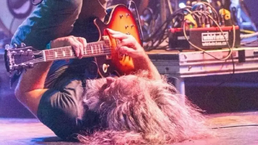 Elliott performs live on stage at Empire Underground, Albany NY — August 5, 2026