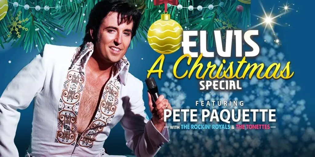Pete Paquette performs as Elvis in white jumpsuit at Elvis: A Christmas Special