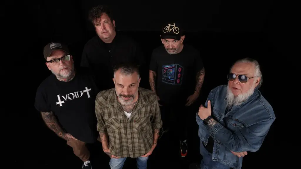 Lucero, five-piece Memphis Americana band, overhead studio promo photo featuring Ben Nichols and Rick Steff