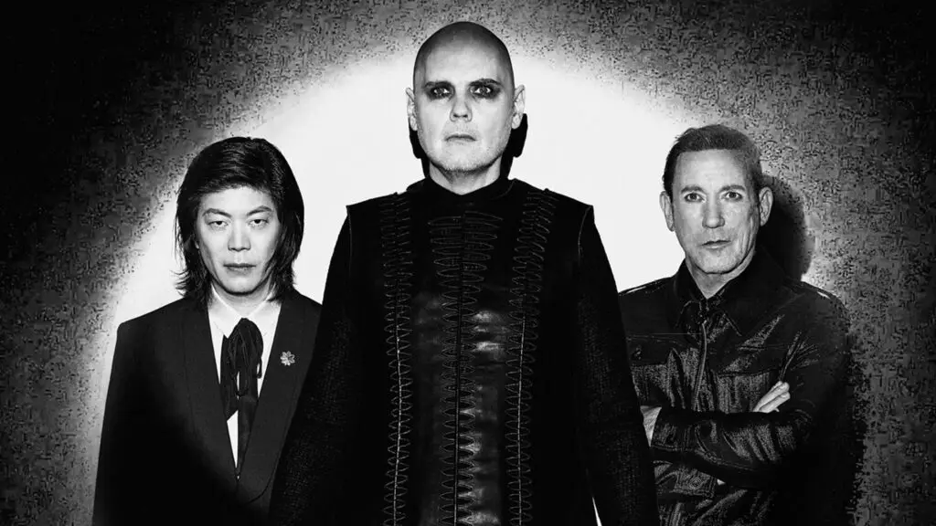 The Smashing Pumpkins — Billy Corgan, James Iha, and Jimmy Chamberlin — official press photo, Rats In A Cage Tour 2026