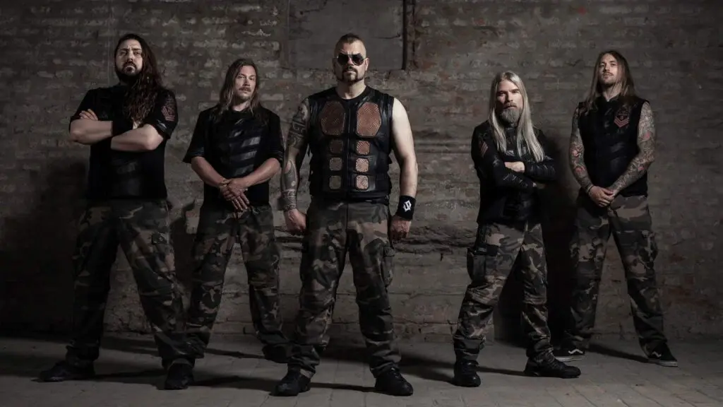 Sabaton five-piece power metal band in military camouflage tactical gear at Place Bell, Laval