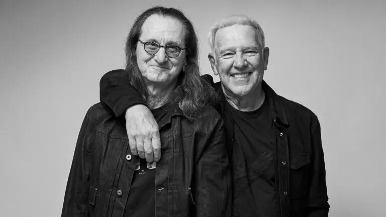 Geddy Lee and Alex Lifeson of Rush, black-and-white studio portrait, Fifty Something Tour 2026