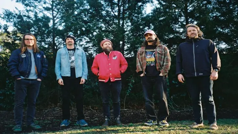 Futurebirds five-piece band pose outdoors in front of trees, Far Out Country Tour 2026 press photo