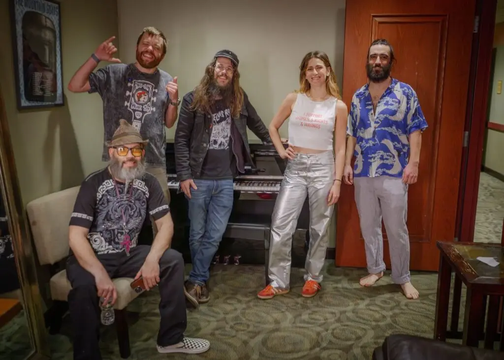 Bearly Dead quintet posed backstage near a grand piano, Boston-based Grateful Dead tribute band