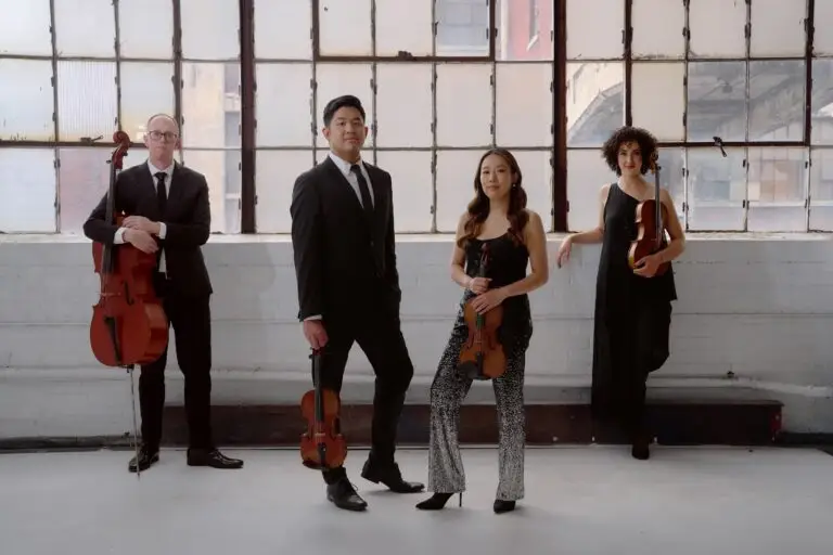 Verona Quartet four string musicians with instruments in industrial loft press photo, Maverick Chamber Music Festival 2026