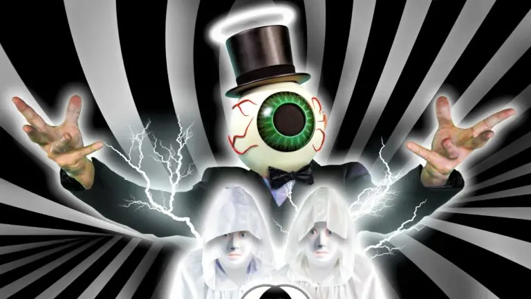 The Residents in their signature eyeball-head costumes performing live on stage