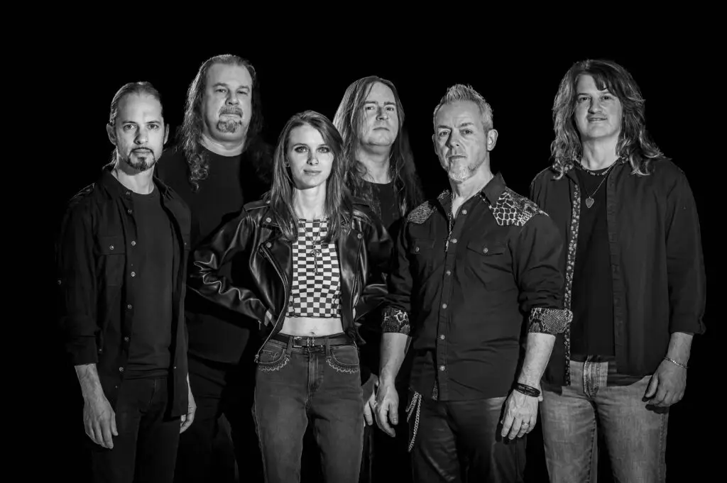 Aquanett, 80s hair metal tribute band, six-piece group press photo in black and white