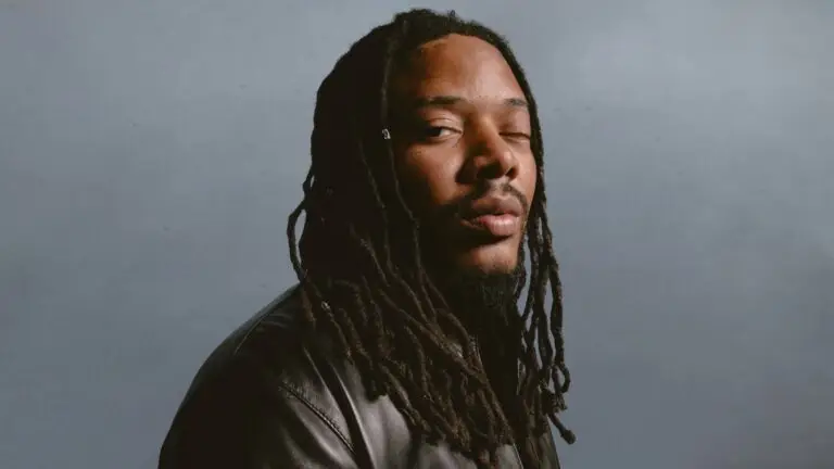 Fetty Wap official press photo, long dreadlocks and black leather jacket
