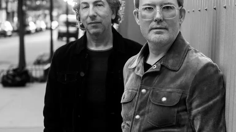 Lost Leaders — Byron Isaacs and Peter Cole — performing duo press photo, urban sidewalk setting