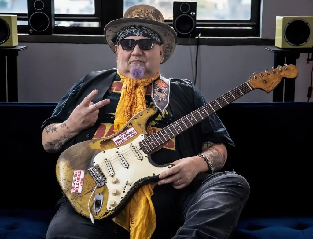 Popa Chubby with his relic Stratocaster guitar, press photo for Popa Plays Hendrix show