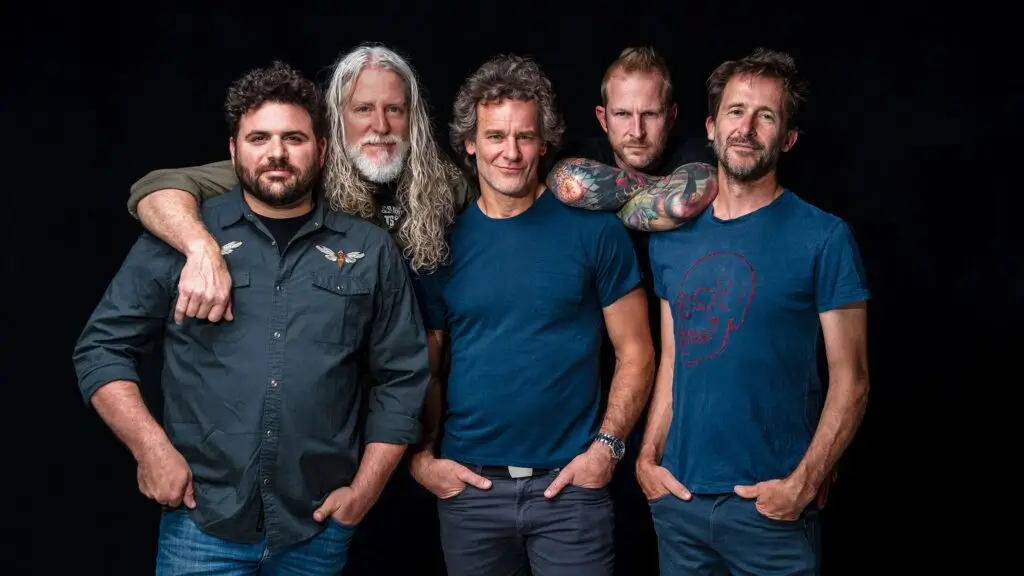 Carbon Leaf band press photo — five members against black studio backdrop