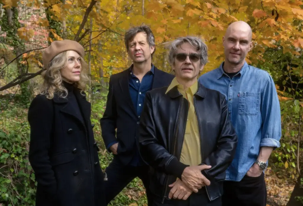 Luna — Dean Wareham, Britta Phillips, Sean Eden, and Lee Wall — outdoor press photo in autumn woodland