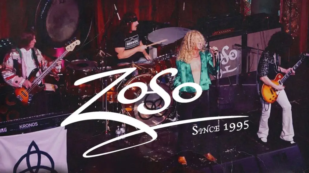 Zoso performing live on stage — vocalist, guitarist, bassist, and drummer recreating the Led Zeppelin experience