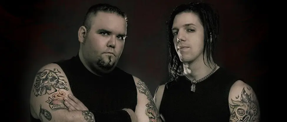 Blitzkid horror punk duo, dark studio press photo with tattoos and gothic aesthetic