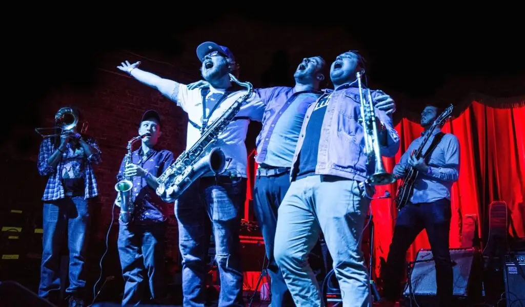 The Brighton Beat performing live, full horn section and guitarist on stage