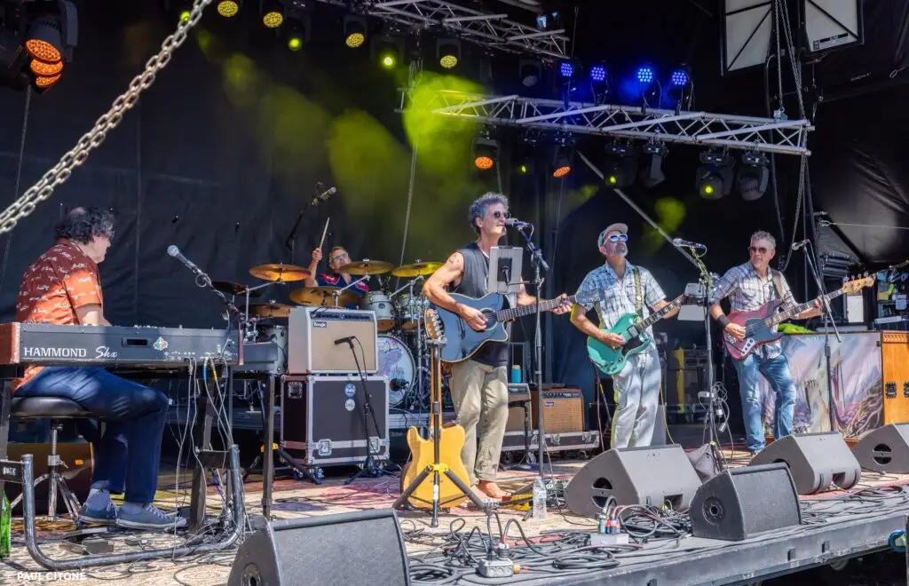 bob. An Interpretation of Dylan performing live on stage, Al Schnier on guitar at moe.down 2026