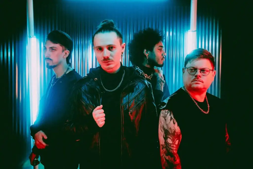 If Not For Me performing live, four-piece metalcore band in moody red and blue studio lighting