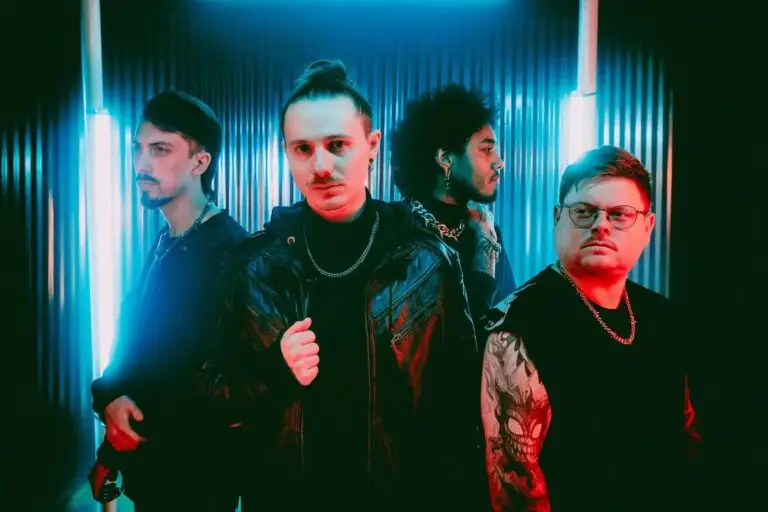 If Not For Me performing live, four-piece metalcore band in moody red and blue studio lighting