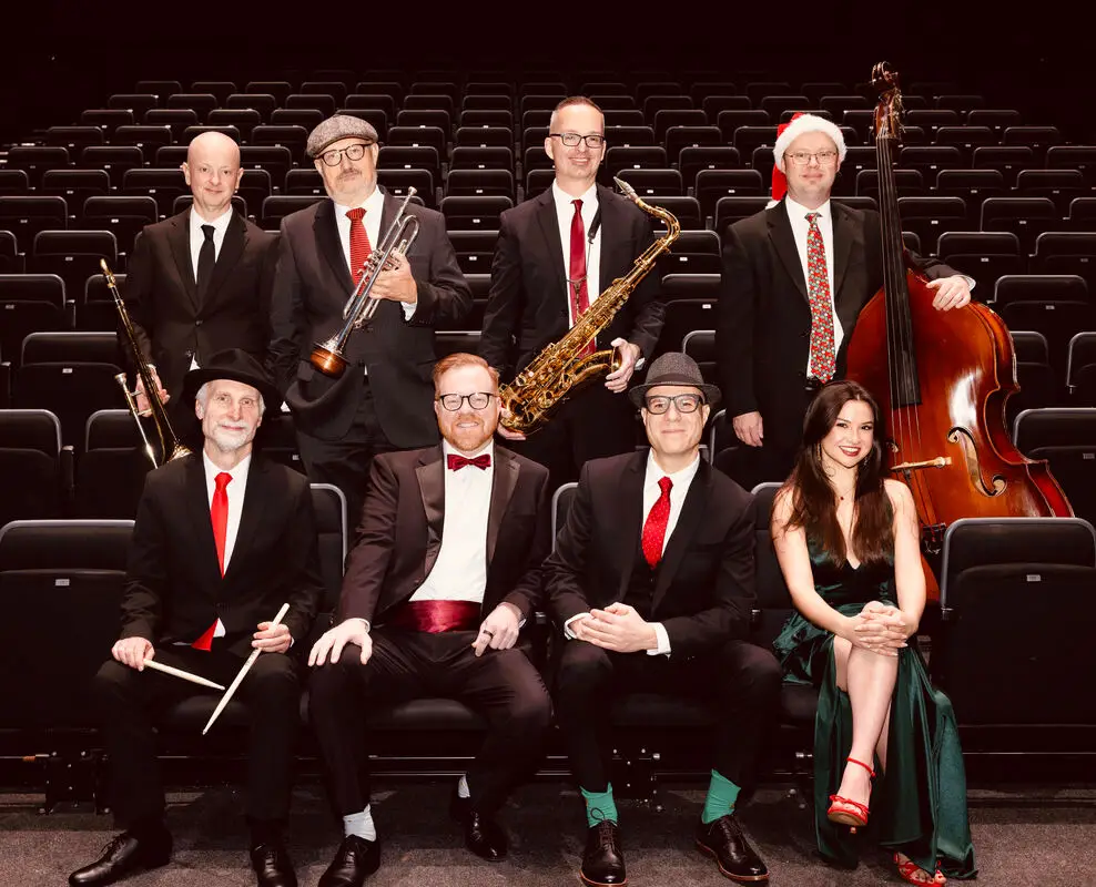 It's a Jazzy Christmas ensemble of 8 musicians in holiday attire, Universal Preservation Hall