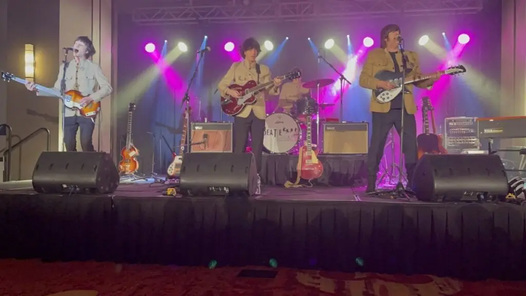Beatlegacy performing live with period Beatles instruments including Höfner bass and Vox amplifiers