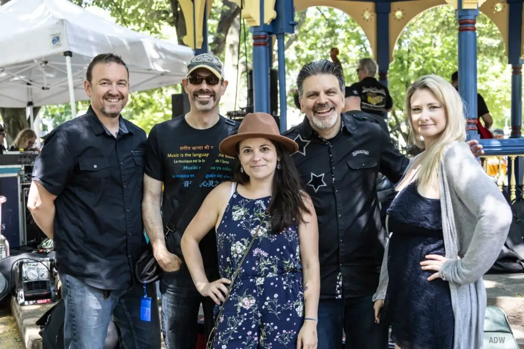 Sarah De Vallière & the Rhythmwell performing at an outdoor summer music festival in Rochester, NY